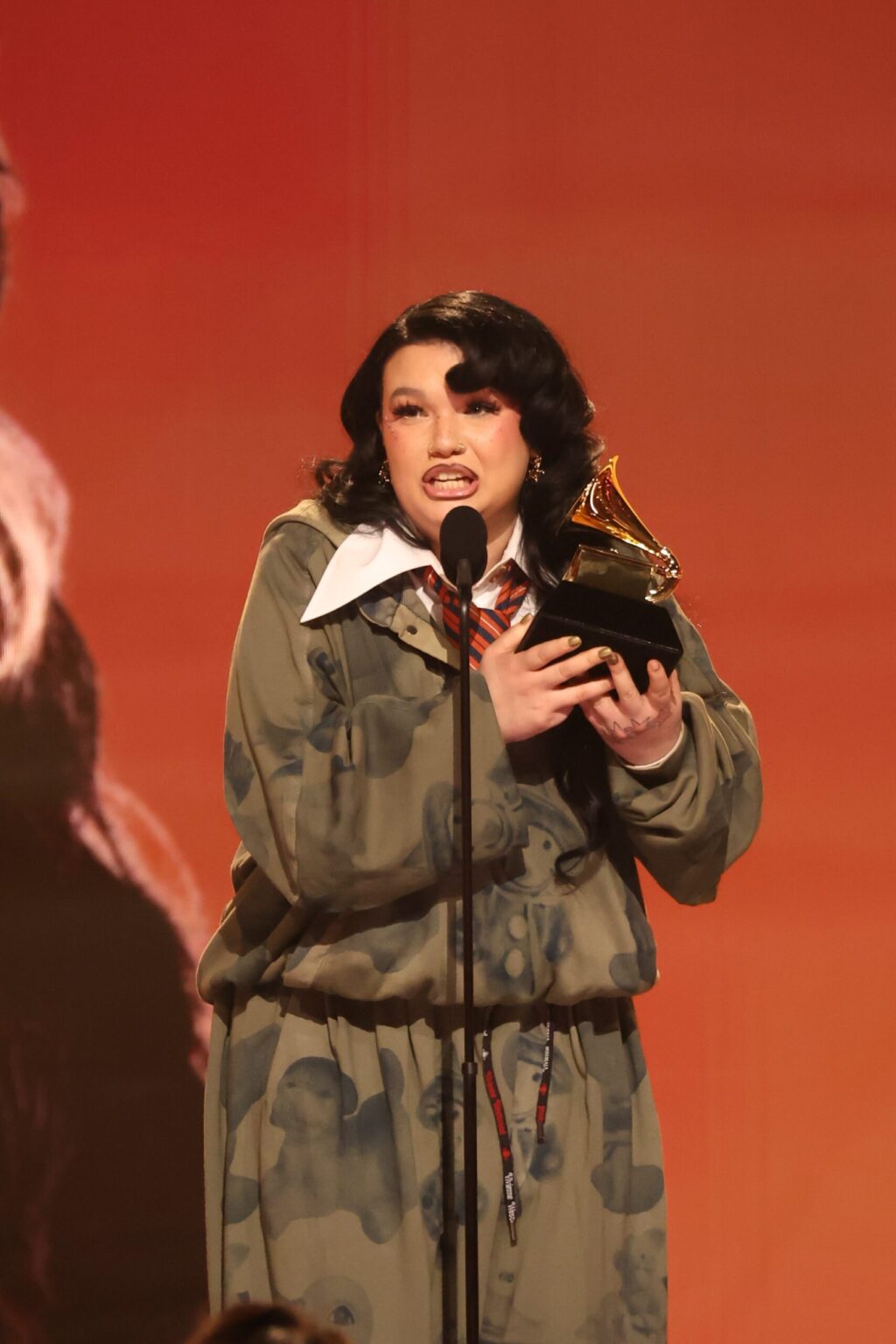 LOS ANGELES, CALIFORNIA - FEBRUARY 01: Lola Young accepts the award for Best Pop Solo Performance for "Messy" onstage during the 68th GRAMMY Awards at Crypto.com Arena on February 01, 2026 in Los Angeles, California. (Photo by Johnny Nunez/Getty Images for The Recording Academy)