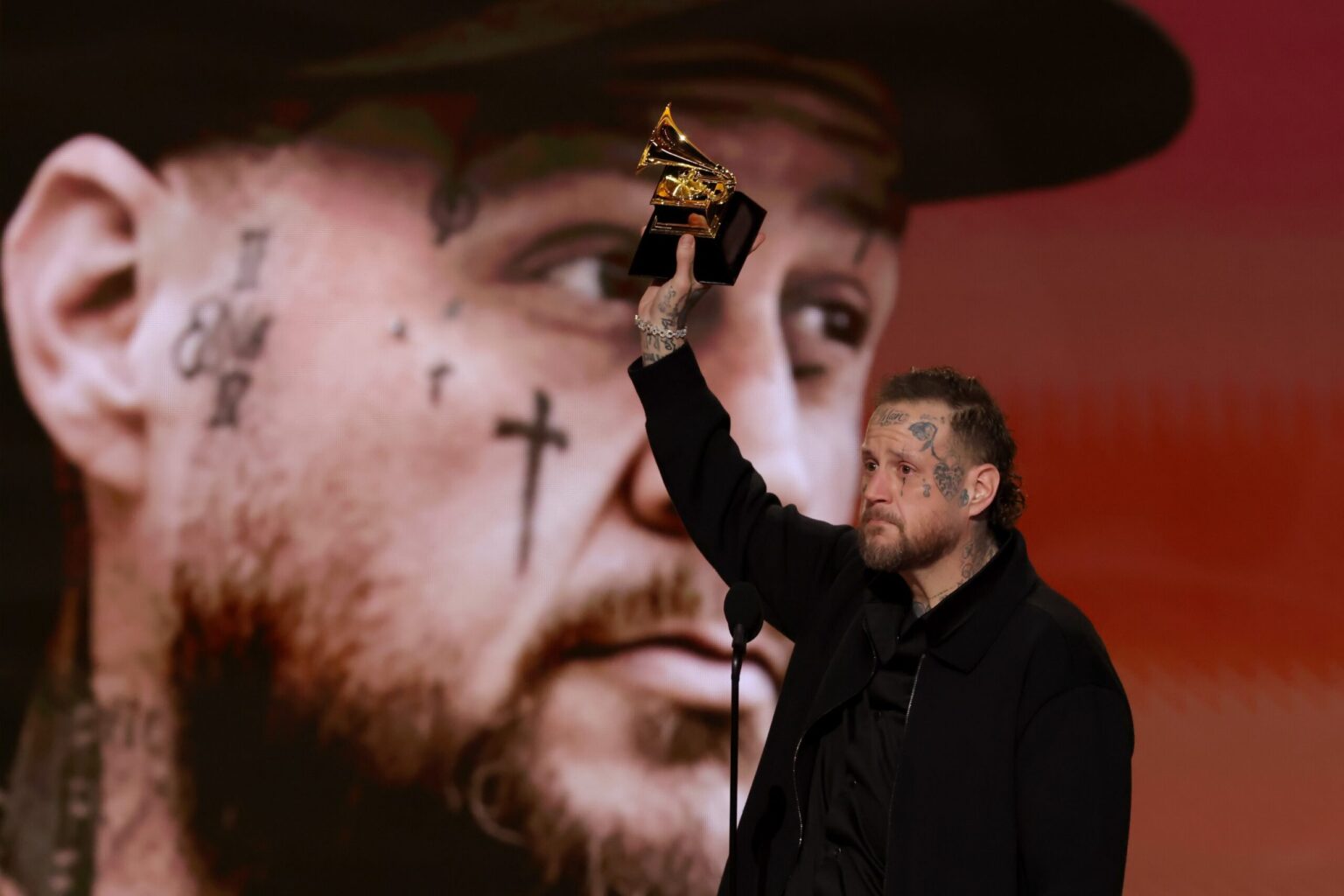 LOS ANGELES, CALIFORNIA - FEBRUARY 01: Jelly Roll accepts the award for Best Contemporary Country Album for "Beautifully Broken" onstage during the 68th GRAMMY Awards at Crypto.com Arena on February 01, 2026 in Los Angeles, California. (Photo by Kevin Winter/Getty Images for The Recording Academy)
