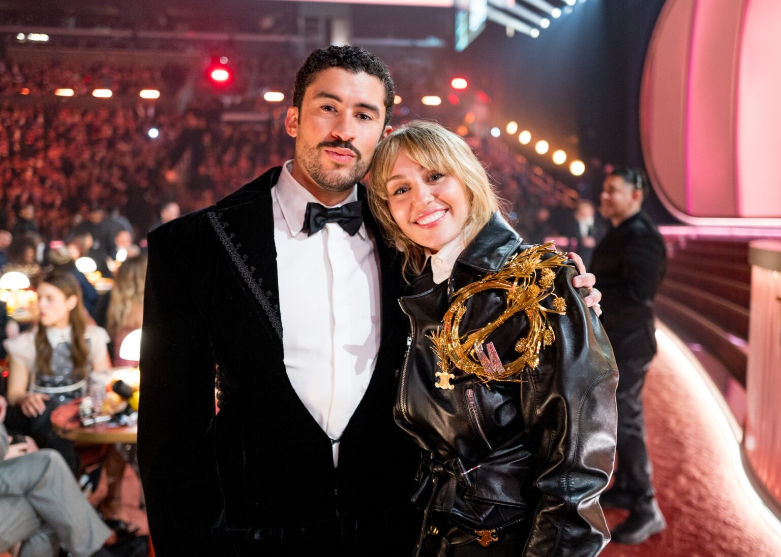 LOS ANGELES, CALIFORNIA - FEBRUARY 01: (L-R) Bad Bunny and Miley Cyrus attend the 68th GRAMMY Awards at Crypto.com Arena on February 01, 2026 in Los Angeles, California. (Photo by John Shearer/Getty Images for The Recording Academy)