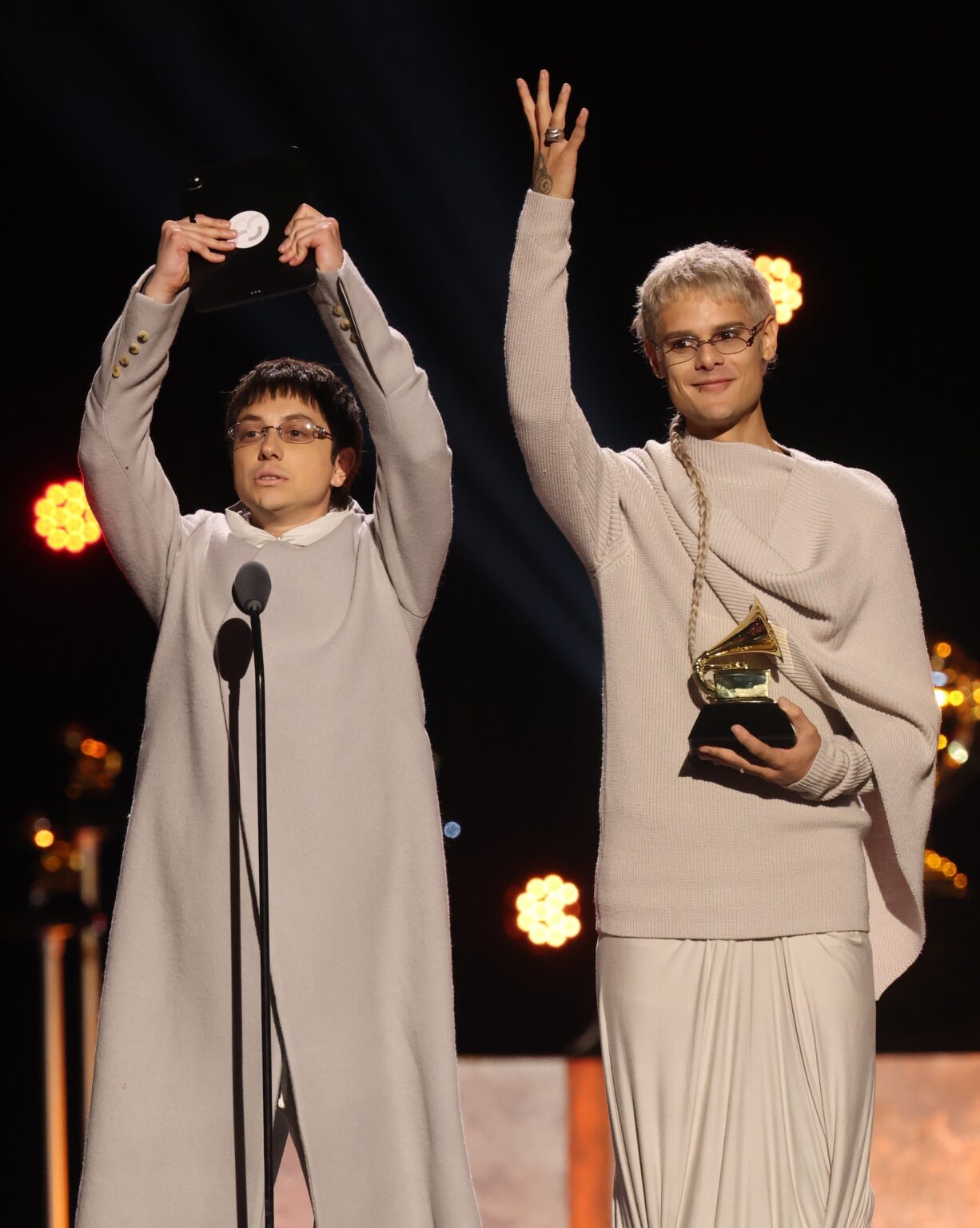LOS ANGELES, CALIFORNIA - FEBRUARY 01: (L-R) Paco Amoroso and CA7RIEL accept the Best Latin Rock or Alternative Album award for "PAPOTA" onstage during the 68th GRAMMY Awards Premiere Ceremony at Peacock Theater on February 01, 2026 in Los Angeles, California. (Photo by Matt Winkelmeyer/Getty Images for The Recording Academy)