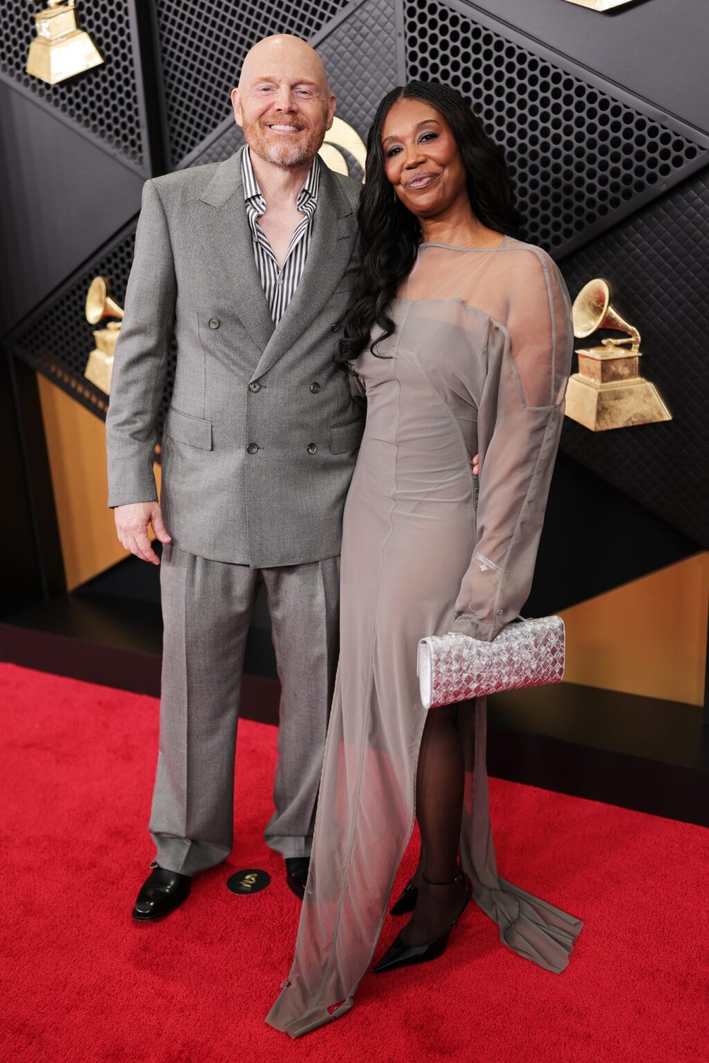 LOS ANGELES, CALIFORNIA - FEBRUARY 01: (L-R) Bill Burr and Nia Renée Hill attend the 68th GRAMMY Awards on February 01, 2026 in Los Angeles, California. (Photo by Neilson Barnard/Getty Images for The Recording Academy)