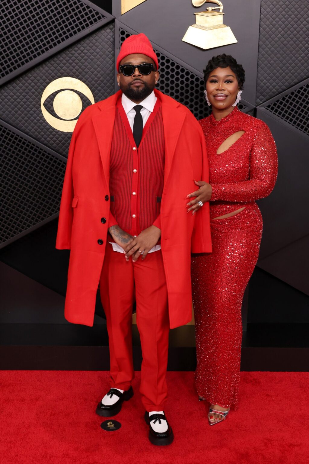 LOS ANGELES, CALIFORNIA - FEBRUARY 01: (L-R) David "DLO" Outing and Bionca Outing attend the 68th GRAMMY Awards on February 01, 2026 in Los Angeles, California. (Photo by John Shearer/Getty Images for The Recording Academy)