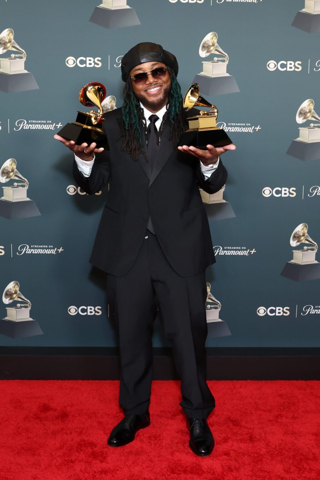 LOS ANGELES, CALIFORNIA - FEBRUARY 01: Leon Thomas, winner of the Best Traditional R&B Performance Award for "Vibes Don't Lie" and Best R&B Album Award for "Mutt", poses in the press room during the 68th GRAMMY Awards at Crypto.com Arena on February 01, 2026 in Los Angeles, California. (Photo by Leon Bennett/Getty Images for The Recording Academy)