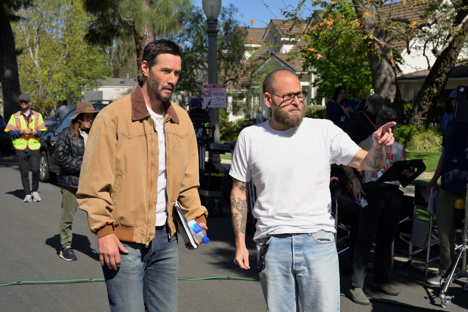 Keanu Reeves and Jonah Hill in "Outcome," premiering April 10, 2026 on Apple TV.