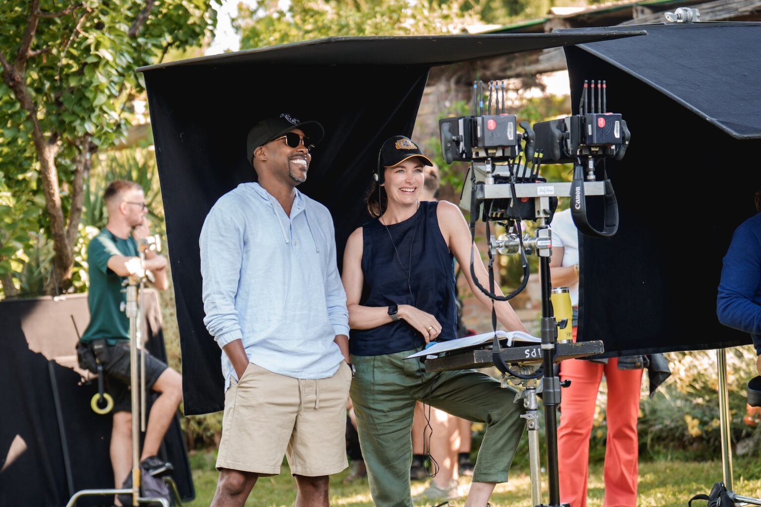 (from left) Producer Will Packer and director Kat Coiro on the set of You, Me & Tuscany. Photo Credit: Giulia Parmigiani/Universal Pictures