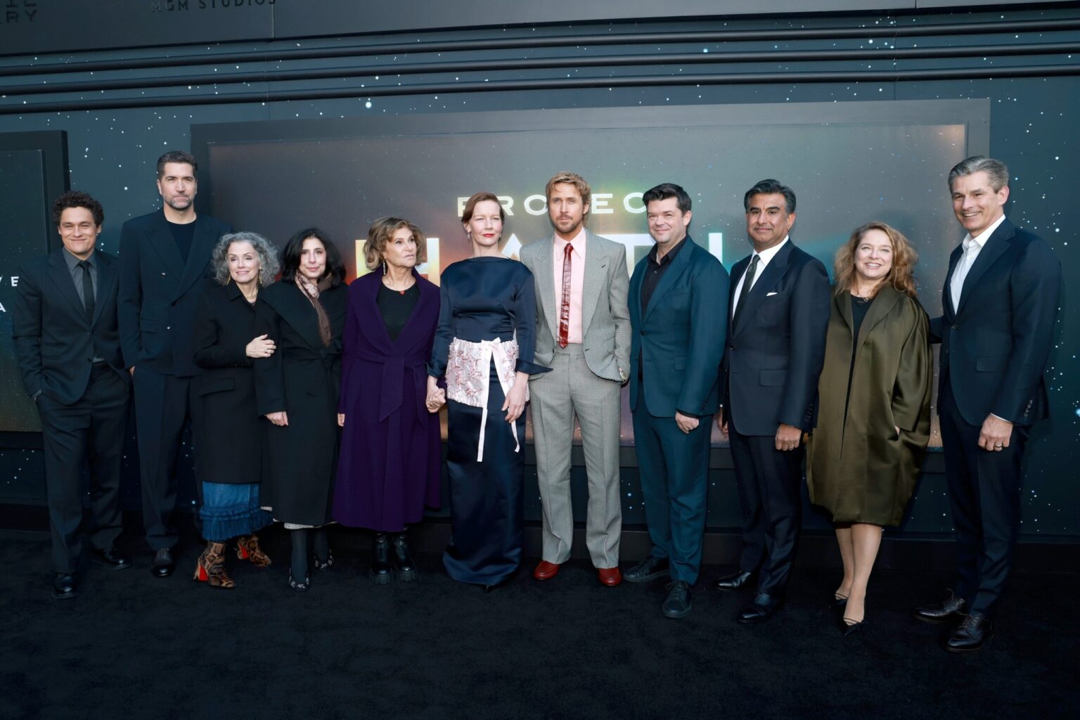 NEW YORK, NEW YORK - MARCH 18: (L-R) Phil Lord, Drew Goddard, Courtenay Valenti, Sue Kroll, Amy Pascal, Sandra Hüller, Ryan Gosling, Chris Miller, Aditya Sood, Rachel O'Connor and Mike Hopkins attend the "Project Hail Mary" New York Premiere at Josie Robertson Plaza at Lincoln Center on March 18, 2026 in New York City. (Photo by Jason Mendez/Getty Images for Amazon MGM Studios)