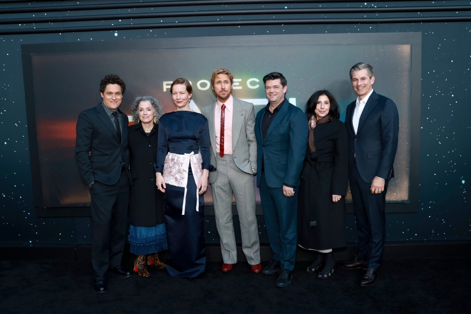 NEW YORK, NEW YORK - MARCH 18: (L-R) Phil Lord, Courtenay Valenti, Sandra Hüller, Ryan Gosling, Chris Miller, Sue Kroll and Mike Hopkins attend the "Project Hail Mary" New York Premiere at Josie Robertson Plaza at Lincoln Center on March 18, 2026 in New York City. (Photo by Jason Mendez/Getty Images for Amazon MGM Studios)