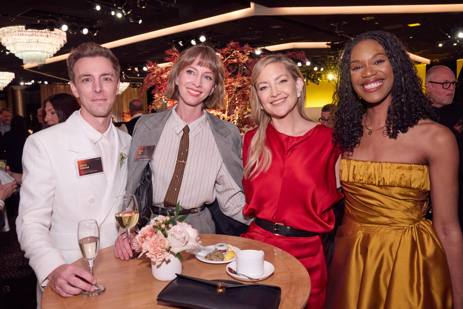 Steve Pinder, Julia Aks, Kate Hudson and Stacy Ike at the Oscar Nominee Luncheon held in the International Ballroom at the Beverly Hilton on Tuesday, February 10, 2026.