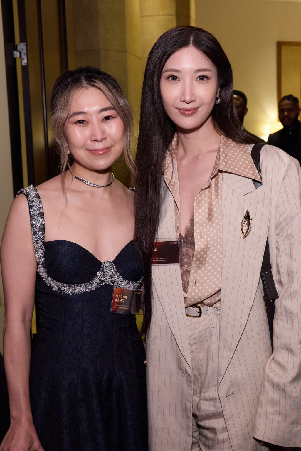 Maggie Kang and EJAE at the Oscar Nominee Luncheon held in the International Ballroom at the Beverly Hilton on Tuesday, February 10, 2026.