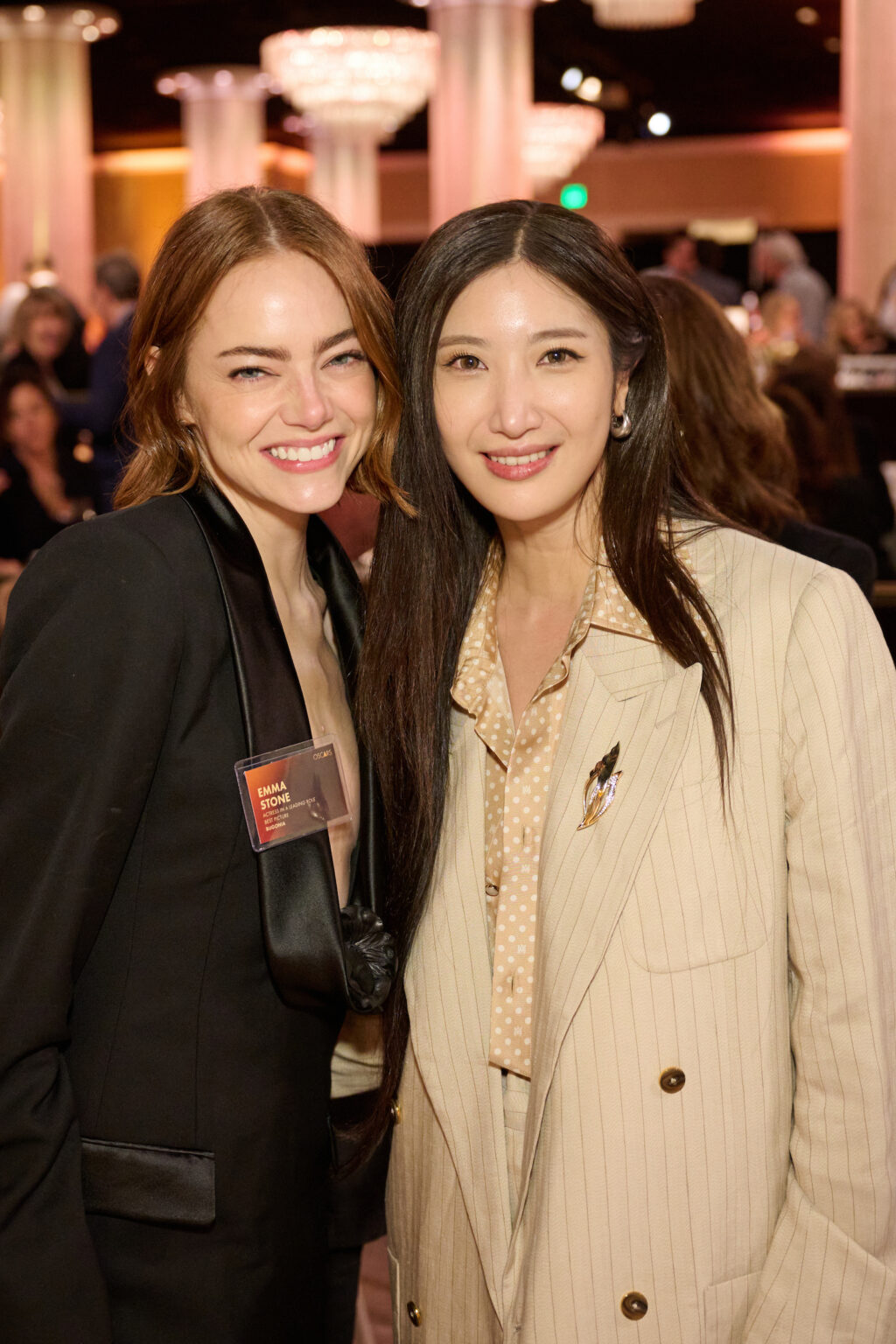 Emma Stone and EJAE at the Oscar Nominee Luncheon held in the International Ballroom at the Beverly Hilton on Tuesday, February 10, 2026.
