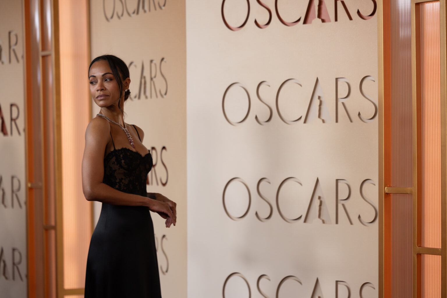 Zoe Saldaña arrives on the red carpet of the 98th Oscars® at the Dolby® Theatre at Ovation Hollywood on Sunday, March 15, 2026.