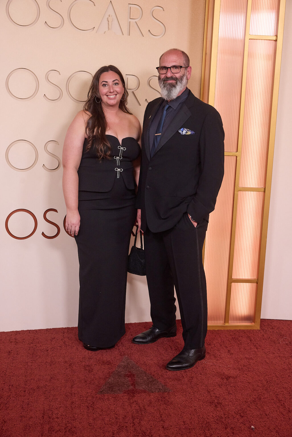 Howard Berger and guest arrive on the red carpet of the 98th Oscars® at the Dolby® Theatre at Ovation Hollywood on Sunday, March 15, 2026.