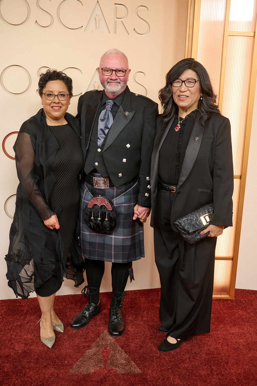 Carrie Lozano, Simon Kilmurry and Jean Tsien arrive on the red carpet of the 98th Oscars® at the Dolby® Theatre at Ovation Hollywood on Sunday, March 15, 2026.