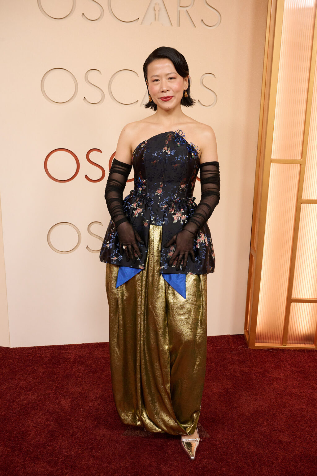 Domee Shi arrives on the red carpet of the 98th Oscars® at the Dolby® Theatre at Ovation Hollywood on Sunday, March 15, 2026.