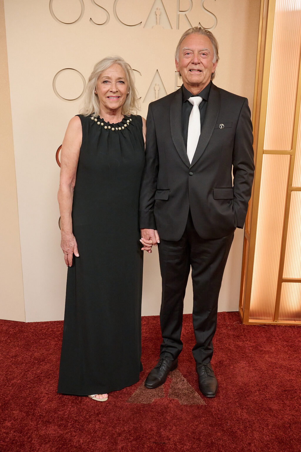 Andy Nelson (R) and guest arrive on the red carpet of the 98th Oscars® at the Dolby® Theatre at Ovation Hollywood on Sunday, March 15, 2026.