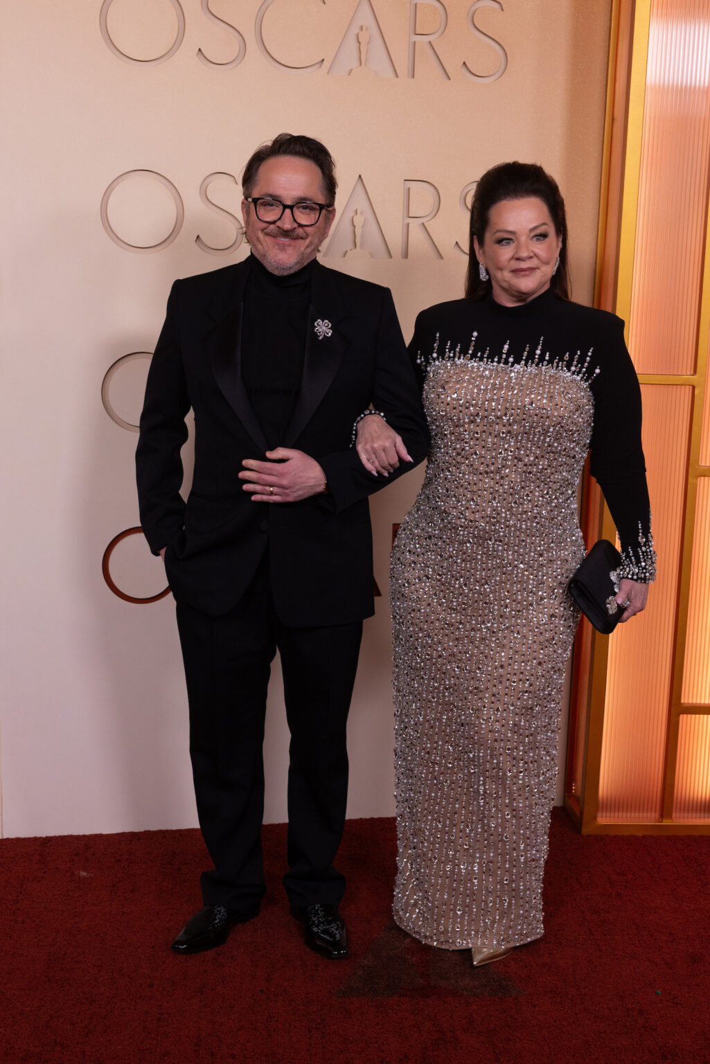 Ben Falcone and Melissa McCarthy arrive on the red carpet of the 98th Oscars® at the Dolby® Theatre at Ovation Hollywood on Sunday, March 15, 2026.