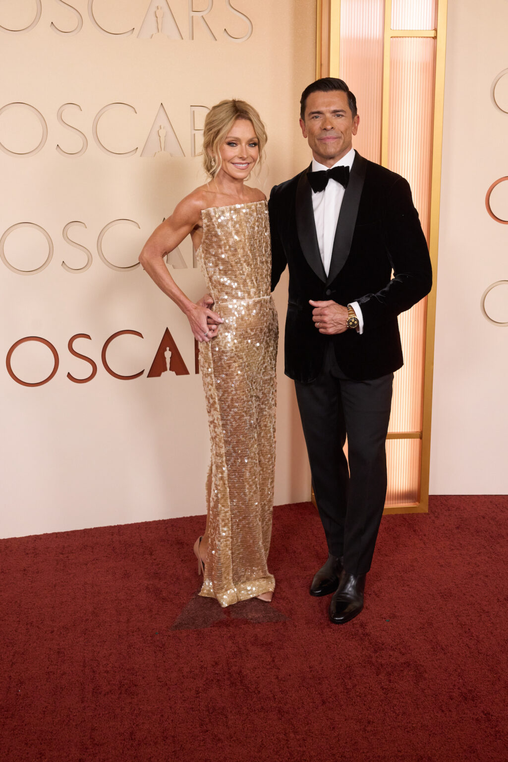 Kelly Ripa and Mark Consuelos arrive on the red carpet of the 98th Oscars® at the Dolby® Theatre at Ovation Hollywood on Sunday, March 15, 2026.
