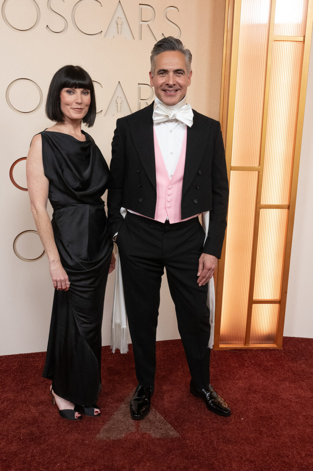 Katy Mullan and Raj Kapoor arrive on the red carpet of the 98th Oscars® at the Dolby® Theatre at Ovation Hollywood on Sunday, March 15, 2026.