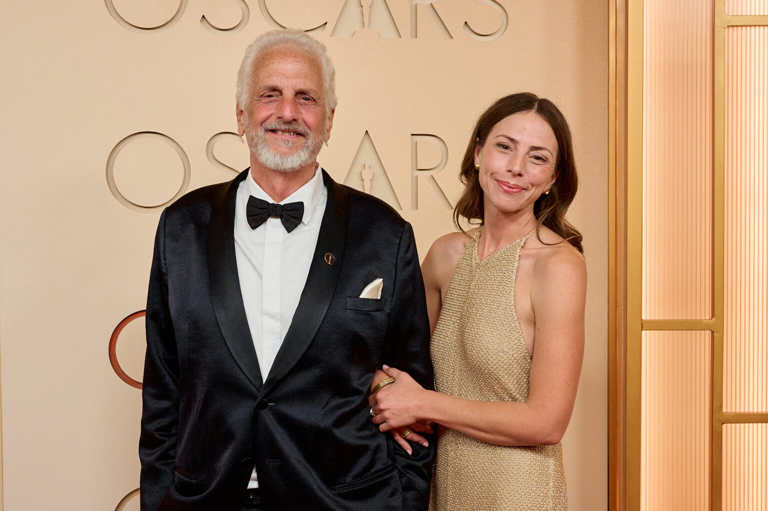 Richard Gibbs and guest arrive on the red carpet of the 98th Oscars® at the Dolby® Theatre at Ovation Hollywood on Sunday, March 15, 2026.