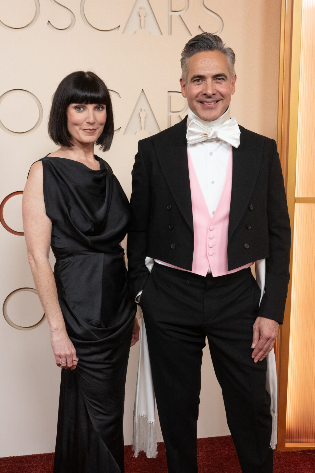 Katy Mullan and Raj Kapoor arrive on the red carpet of the 98th Oscars® at the Dolby® Theatre at Ovation Hollywood on Sunday, March 15, 2026.