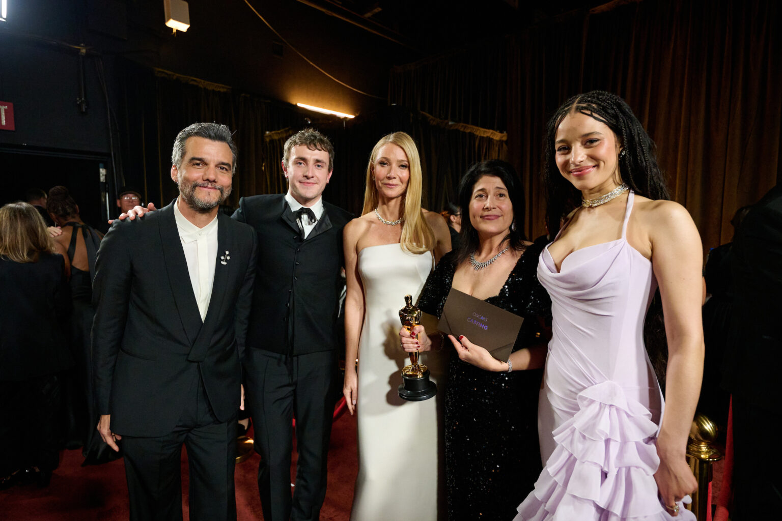 Wagner Moura, Paul Mescal, Gwyneth Paltrow, Cassandra Kulukundis, and Chase Infiniti pose backstage with the Oscar® for Casting during the 98th Oscars® at Dolby® Theatre at Ovation Hollywood on Sunday, March 15, 2026.