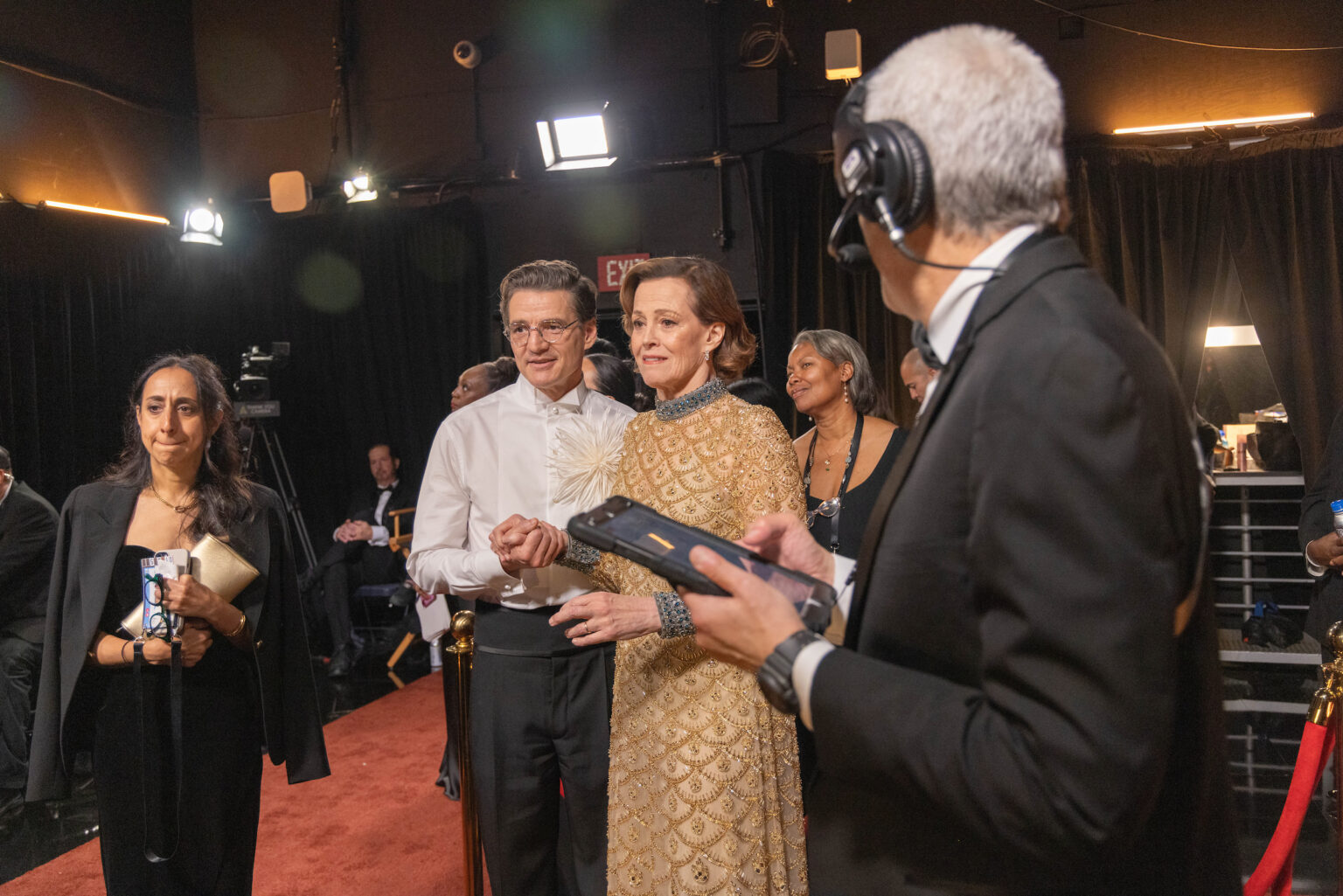 Pedro Pascal and Sigourney Weaver wait backstage before presenting the Oscar® for Production Design during the 98th Oscars® at the Dolby® Theatre at Ovation Hollywood on Sunday, March 15, 2026.