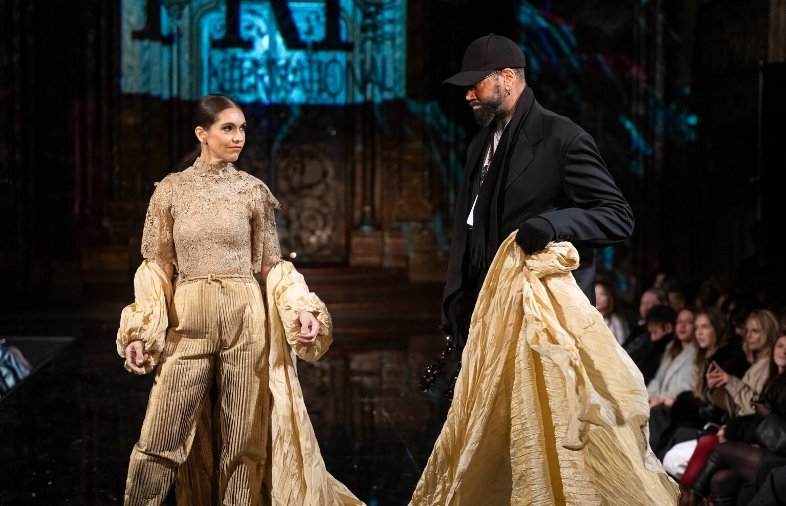 NEW YORK, NEW YORK - FEBRUARY 12: Designer Franklin Rowe and model walk the runway at the Franklin Rowe show during New York Fashion Week Powered By Art Hearts Fashion at The Angel Orensanz Foundation on February 12, 2026 in New York City. (Photo by Mark Gunter/Getty Images for Art Hearts Fashion)