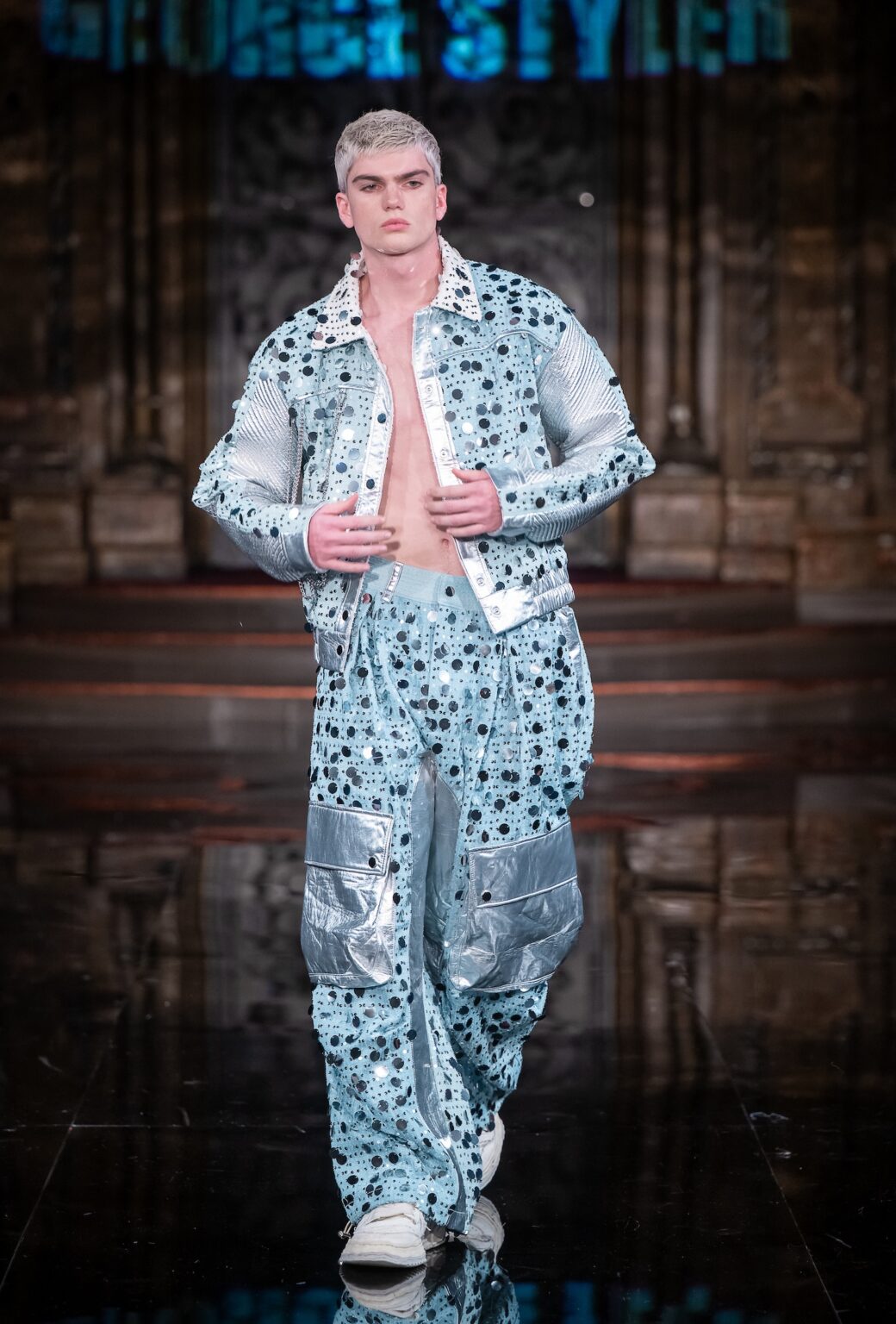 NEW YORK, NEW YORK - FEBRUARY 13: A model walks the runway at the George Styler show during New York Fashion Week Powered By Art Hearts Fashion at The Angel Orensanz Foundation on February 13, 2026 in New York City. (Photo by Mark Gunter/Getty Images for Art Hearts Fashion)
