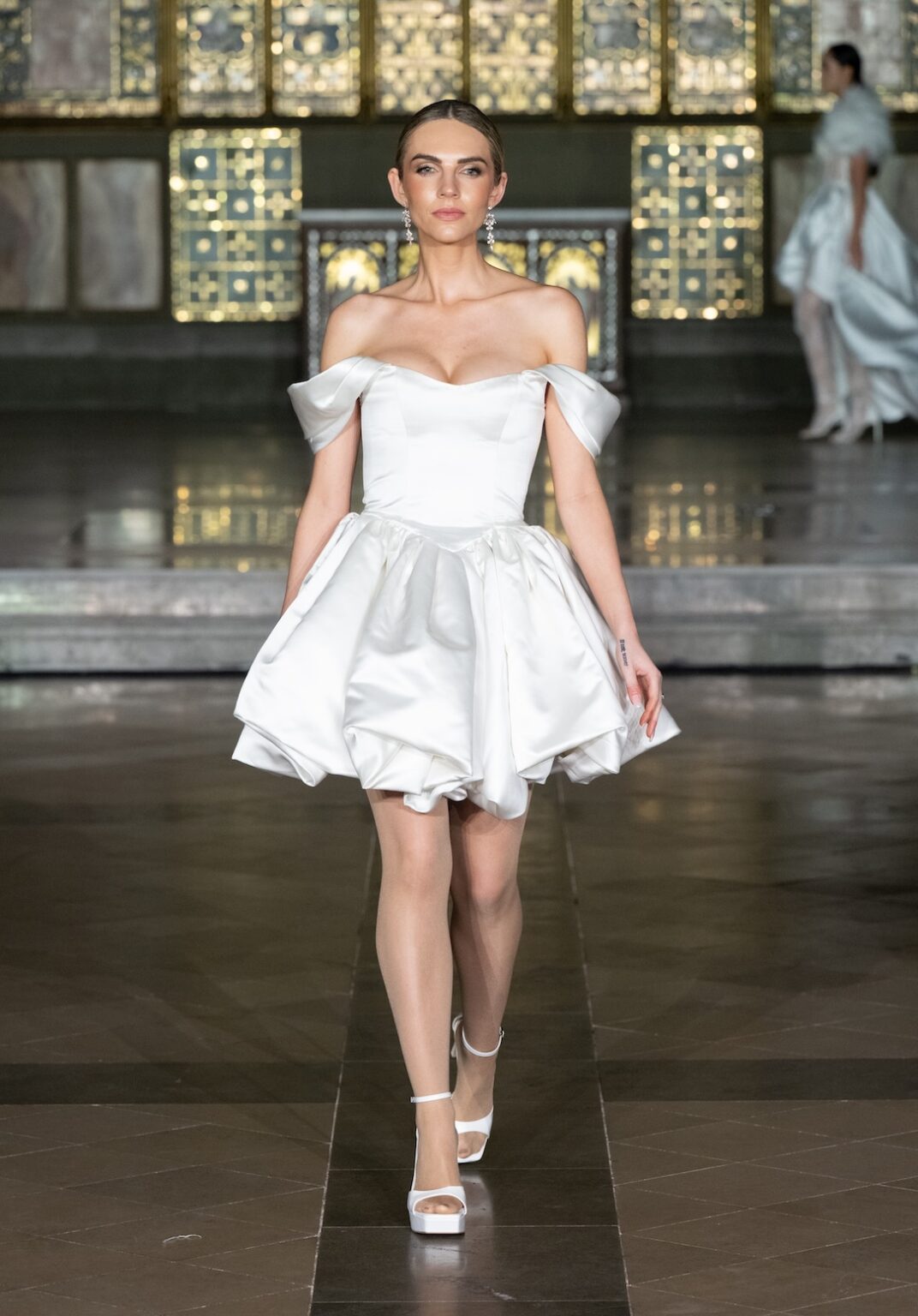 LONDON, ENGLAND - FEBRUARY 20: A model walks the runway at the Glaudi Show during London Fashion Week Powered By Art Hearts Fashion February 20, 2026 at St. John's Hyde Park on February 20, 2026 in London, England. (Photo by Mark Gunter/Getty Images for Art Hearts Fashion)