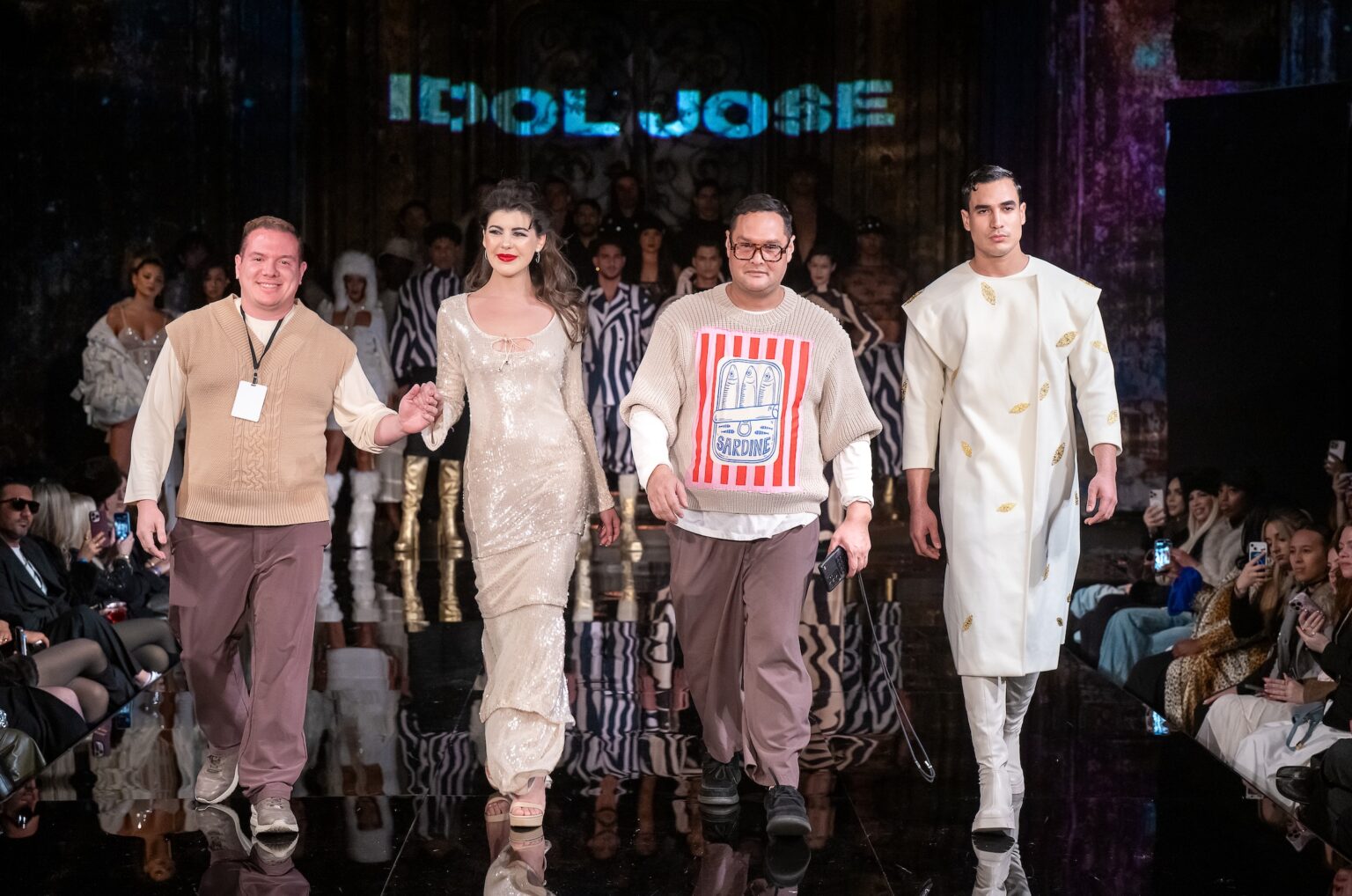 NEW YORK, NEW YORK - FEBRUARY 13: Designers Idolfredo Hernandez, Juan Francisco Cabello, Valeria Cannavo and model walk the runway at the Idol Jose show during New York Fashion Week Powered By Art Hearts Fashion at The Angel Orensanz Foundation on February 13, 2026 in New York City.  (Photo by Mark Gunter/Getty Images for Art Hearts Fashion)