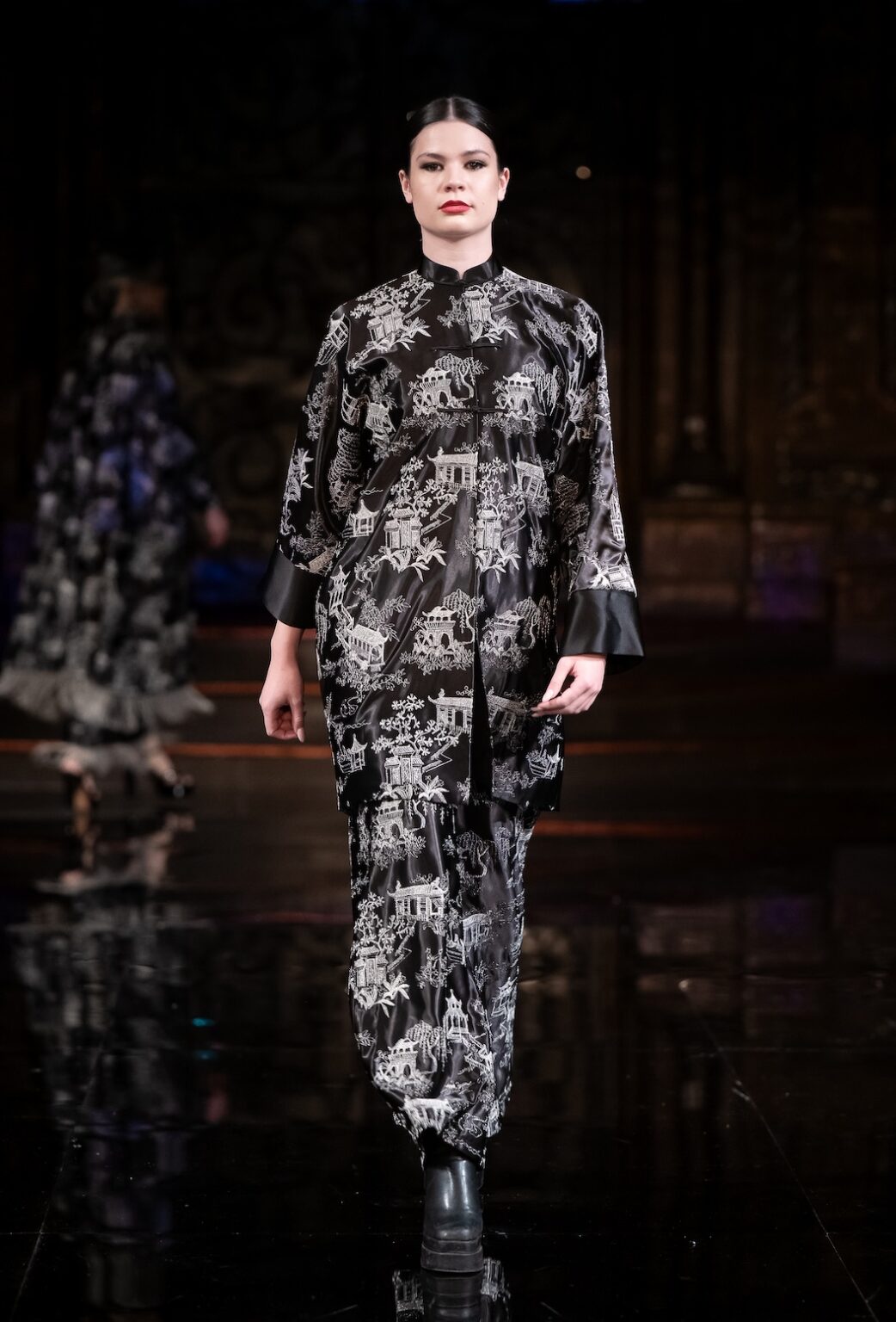 NEW YORK, NEW YORK - FEBRUARY 12: √ walks the runway at the Jingbo Yang show during New York Fashion Week Powered By Art Hearts Fashion at The Angel Orensanz Foundation on February 12, 2026 in New York City. (Photo by Mark Gunter/Getty Images for Art Hearts Fashion)