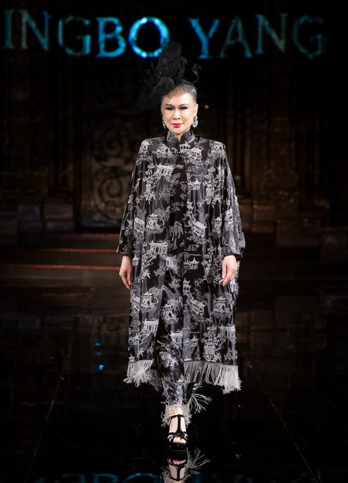NEW YORK, NEW YORK - FEBRUARY 12: A model walks the runway at the Jingbo Yang show during New York Fashion Week Powered By Art Hearts Fashion at The Angel Orensanz Foundation on February 12, 2026 in New York City. (Photo by Mark Gunter/Getty Images for Art Hearts Fashion)