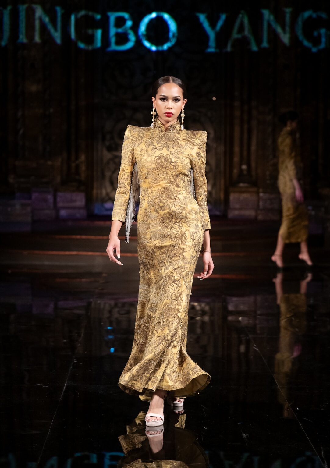 NEW YORK, NEW YORK - FEBRUARY 12: A model walks the runway at the Jingbo Yang show during New York Fashion Week Powered By Art Hearts Fashion at The Angel Orensanz Foundation on February 12, 2026 in New York City. (Photo by Mark Gunter/Getty Images for Art Hearts Fashion)