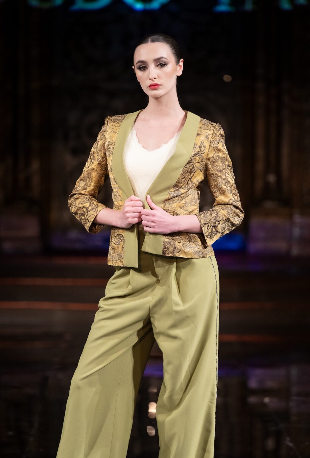 NEW YORK, NEW YORK - FEBRUARY 12: A model walks the runway at the Jingbo Yang show during New York Fashion Week Powered By Art Hearts Fashion at The Angel Orensanz Foundation on February 12, 2026 in New York City. (Photo by Mark Gunter/Getty Images for Art Hearts Fashion)