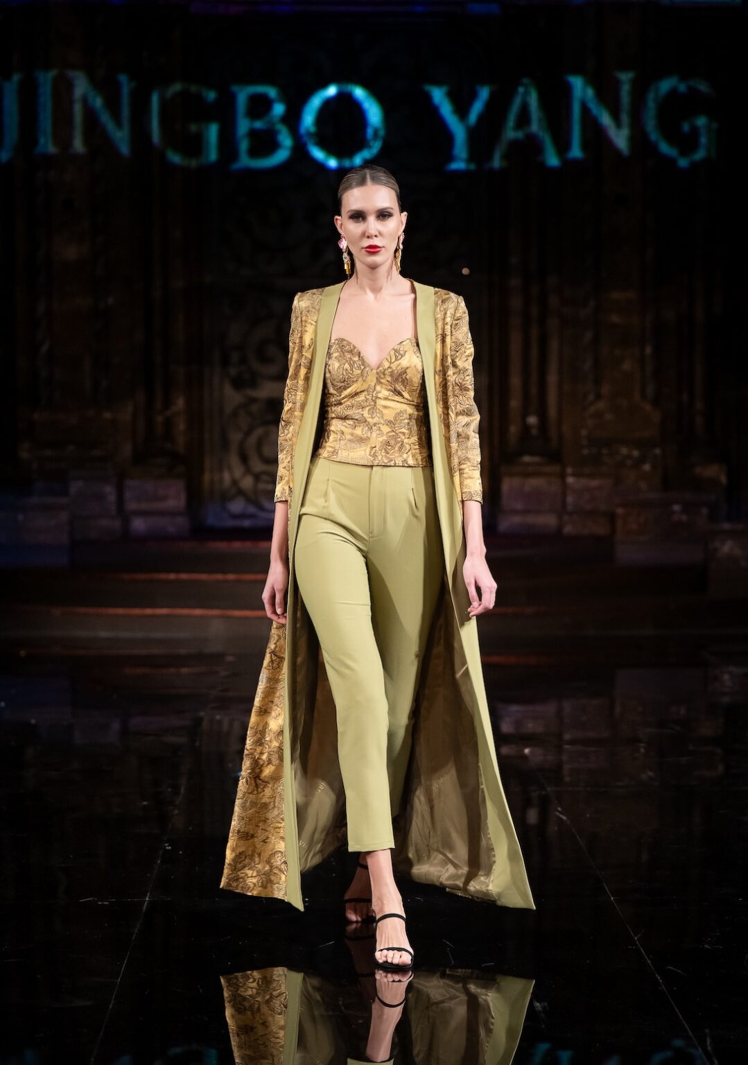 NEW YORK, NEW YORK - FEBRUARY 12: A model walks the runway at the Jingbo Yang show during New York Fashion Week Powered By Art Hearts Fashion at The Angel Orensanz Foundation on February 12, 2026 in New York City. (Photo by Mark Gunter/Getty Images for Art Hearts Fashion)
