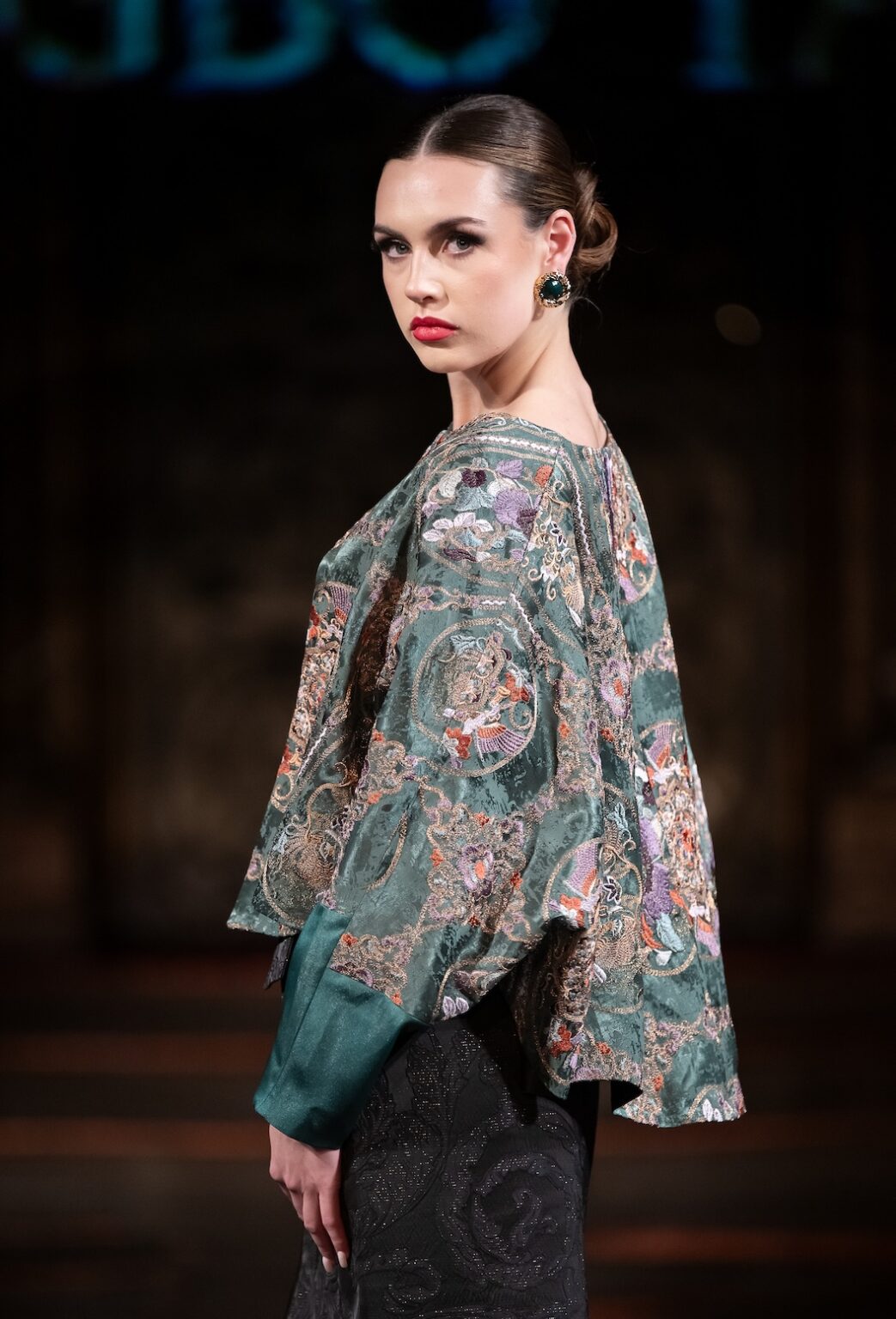 NEW YORK, NEW YORK - FEBRUARY 12: A model walks the runway at the Jingbo Yang show during New York Fashion Week Powered By Art Hearts Fashion at The Angel Orensanz Foundation on February 12, 2026 in New York City. (Photo by Mark Gunter/Getty Images for Art Hearts Fashion)