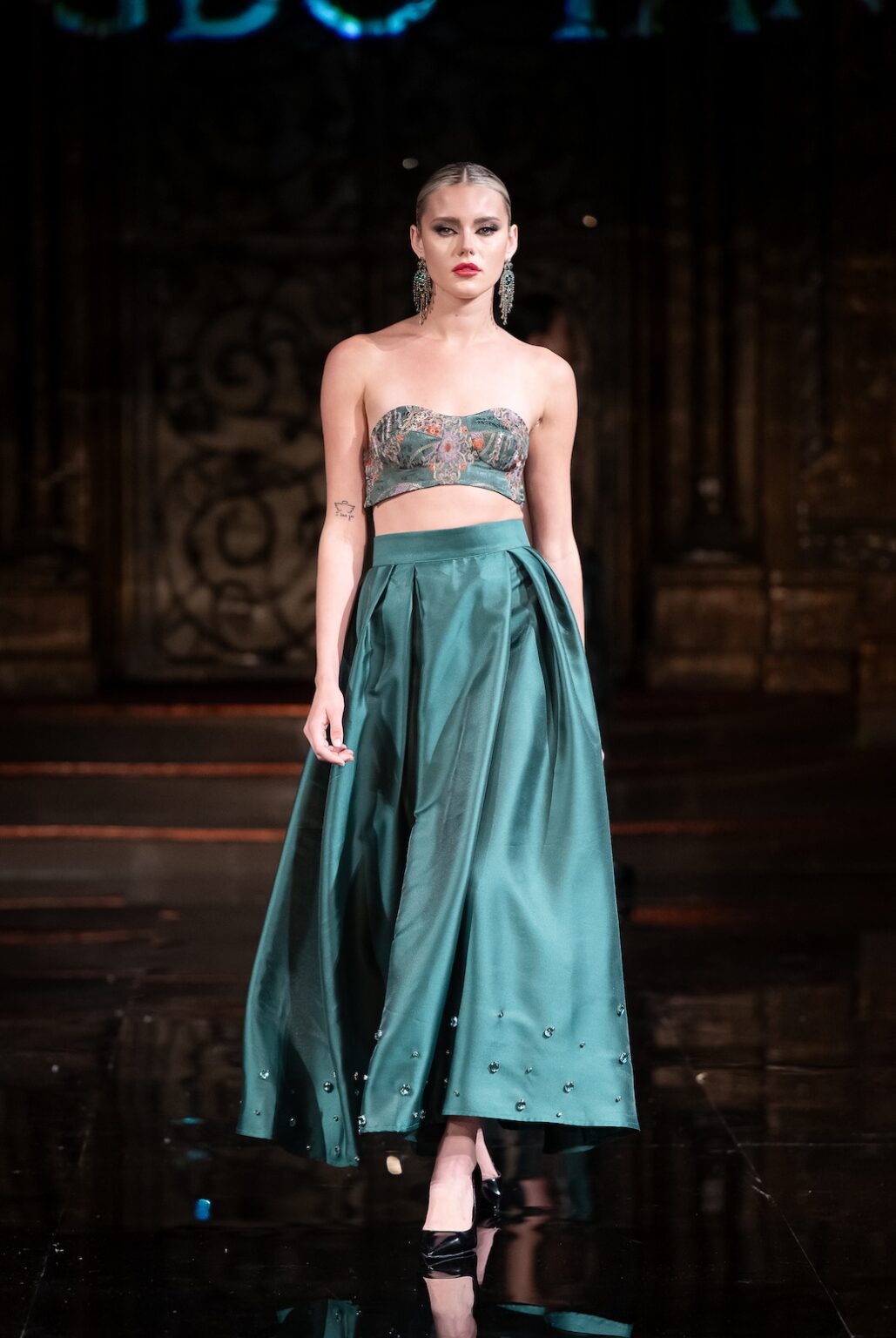 NEW YORK, NEW YORK - FEBRUARY 12: A model walks the runway at the Jingbo Yang show during New York Fashion Week Powered By Art Hearts Fashion at The Angel Orensanz Foundation on February 12, 2026 in New York City. (Photo by Mark Gunter/Getty Images for Art Hearts Fashion)