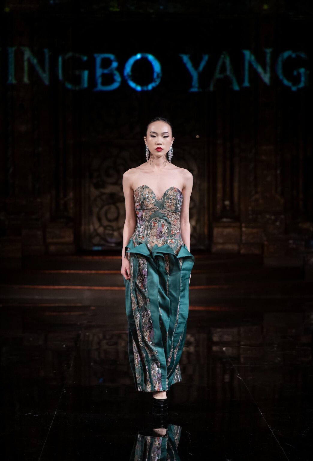 NEW YORK, NEW YORK - FEBRUARY 12: A model walks the runway at the Jingbo Yang show during New York Fashion Week Powered By Art Hearts Fashion at The Angel Orensanz Foundation on February 12, 2026 in New York City. (Photo by Mark Gunter/Getty Images for Art Hearts Fashion)