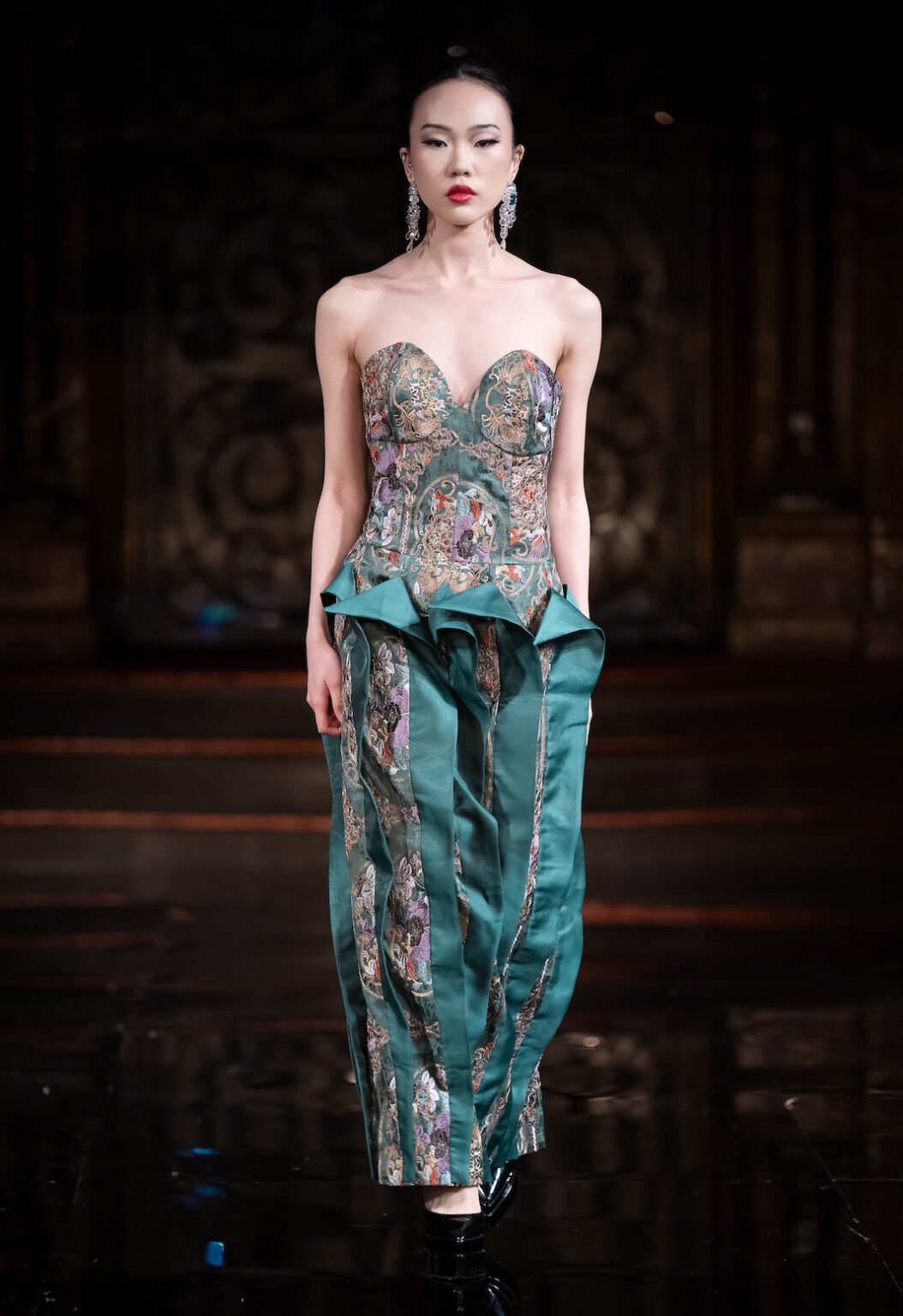 NEW YORK, NEW YORK - FEBRUARY 12: A model walks the runway at the Jingbo Yang show during New York Fashion Week Powered By Art Hearts Fashion at The Angel Orensanz Foundation on February 12, 2026 in New York City. (Photo by Mark Gunter/Getty Images for Art Hearts Fashion)