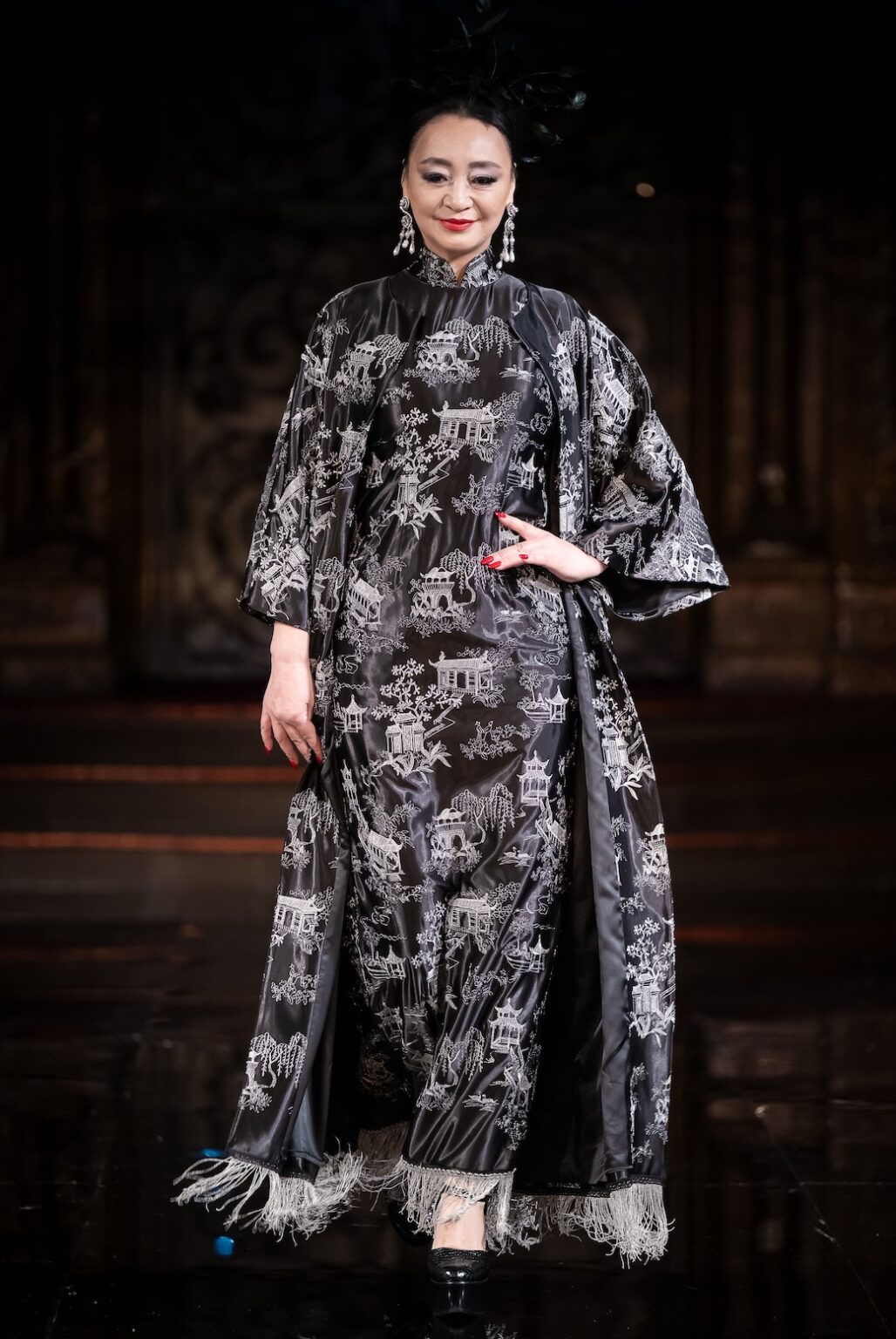 NEW YORK, NEW YORK - FEBRUARY 12: A model walks the runway at the Jingbo Yang show during New York Fashion Week Powered By Art Hearts Fashion at The Angel Orensanz Foundation on February 12, 2026 in New York City. (Photo by Mark Gunter/Getty Images for Art Hearts Fashion)