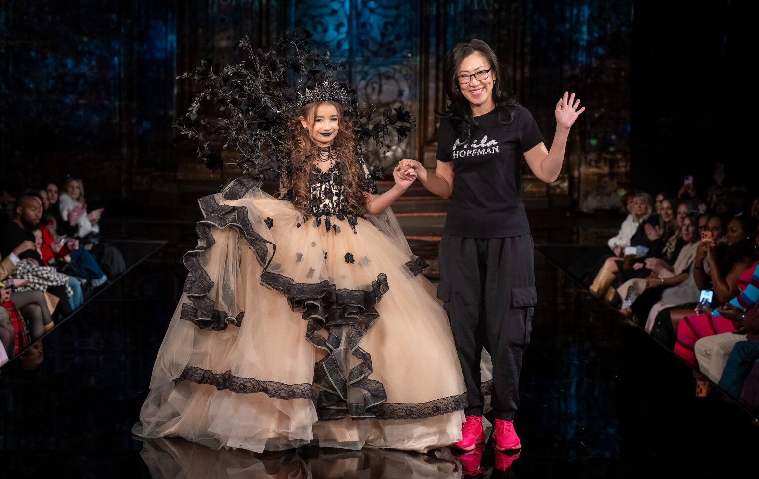 NEW YORK, NEW YORK - FEBRUARY 13: Designer Mila Hoffman and model walk the runway at the Mila Hoffman show during New York Fashion Week Powered By Art Hearts Fashion at The Angel Orensanz Foundation on February 13, 2026 in New York City.  (Photo by Mark Gunter/Getty Images for Art Hearts Fashion)