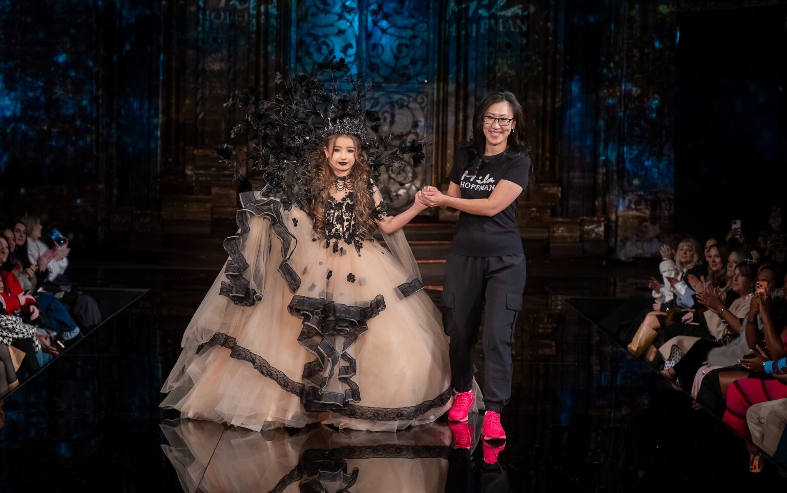 NEW YORK, NEW YORK - FEBRUARY 13: Designer Mila Hoffman and model walk the runway at the Mila Hoffman show during New York Fashion Week Powered By Art Hearts Fashion at The Angel Orensanz Foundation on February 13, 2026 in New York City.  (Photo by Mark Gunter/Getty Images for Art Hearts Fashion)