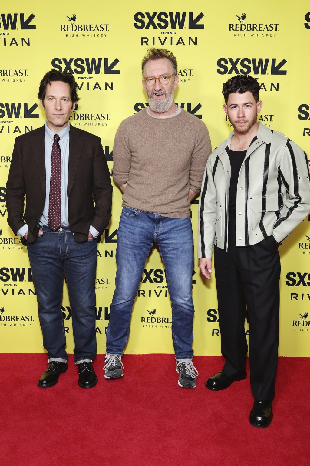 AUSTIN, TEXAS - MARCH 14: (L-R) Paul Rudd, John Carney and Nick Jonas attend the premiere of "Power Ballad" during SXSW at The Paramount Theatre on March 14, 2026 in Austin, Texas. (Photo by Robin Marchant/Getty Images for Lionsgate)