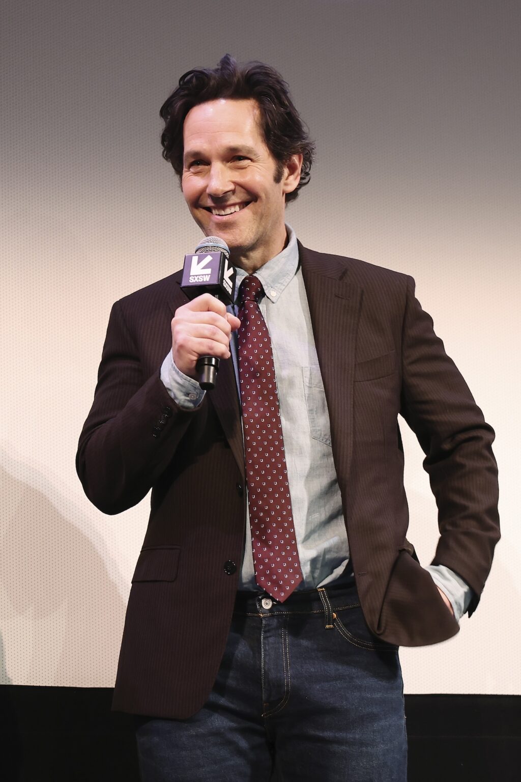 AUSTIN, TEXAS - MARCH 14: Paul Rudd speaks onstage during the premiere of "Power Ballad" during SXSW at The Paramount Theatre on March 14, 2026 in Austin, Texas. (Photo by Robin Marchant/Getty Images for Lionsgate)
