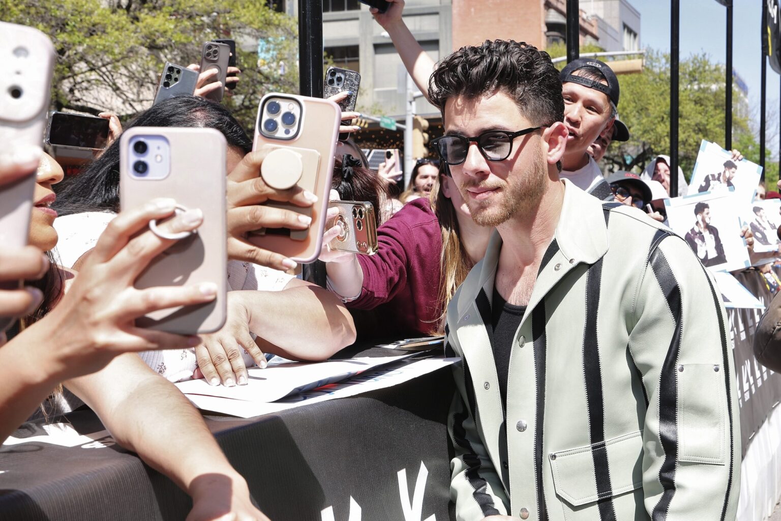 AUSTIN, TEXAS - MARCH 14: Nick Jonas greets fans during the premiere of "Power Ballad" during SXSW at The Paramount Theatre on March 14, 2026 in Austin, Texas. (Photo by Robin Marchant/Getty Images for Lionsgate)