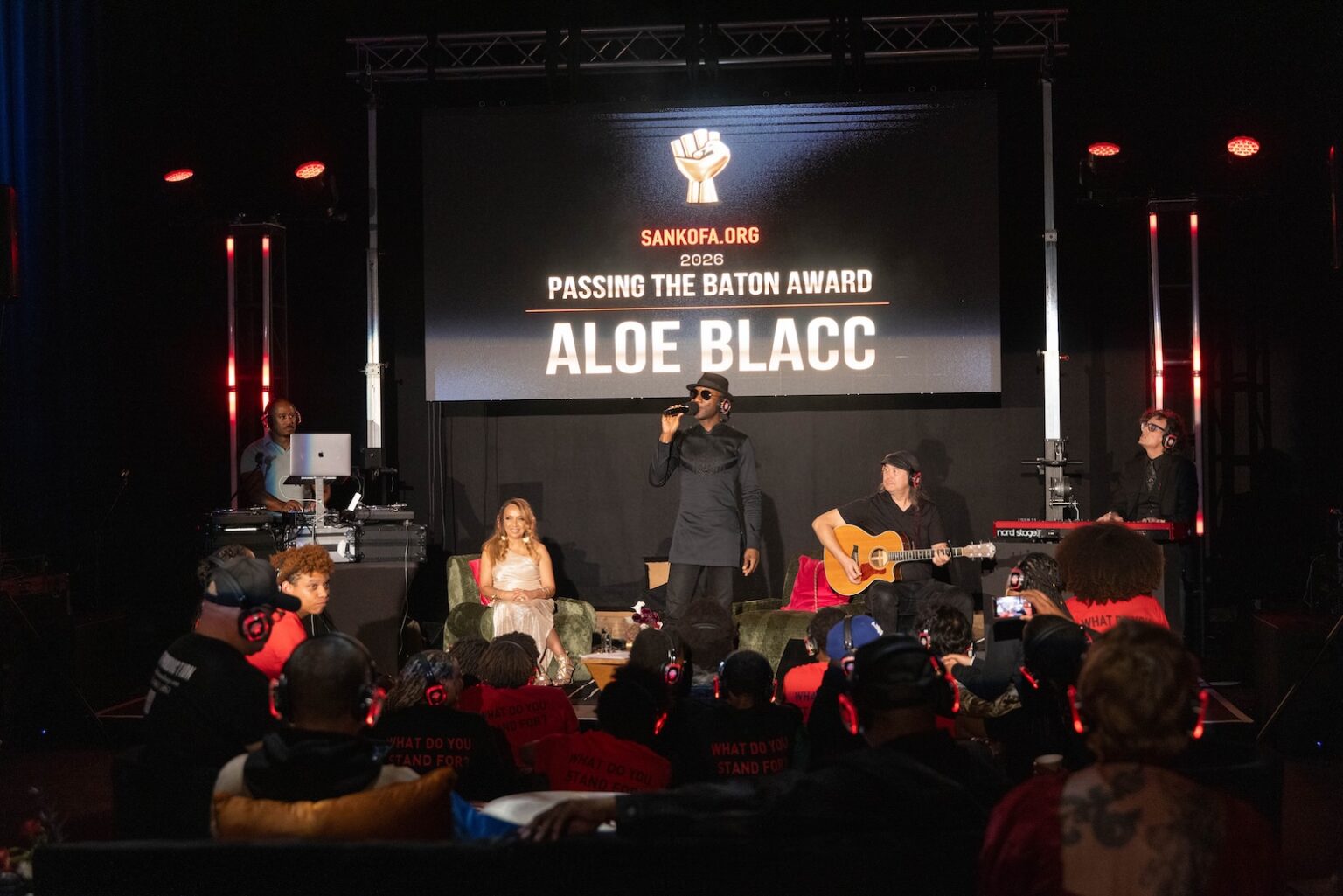 LOS ANGELES, CALIFORNIA - MARCH 1: Aloe Blacc performs after receiving the 2026 Passing the Baton Award at the inaugural Sankofa.org Social Justice Awards at Chaplin Studios on March 1, 2026 in Los Angeles, California. (Photo by Todd Westphal / Sankofa.org)