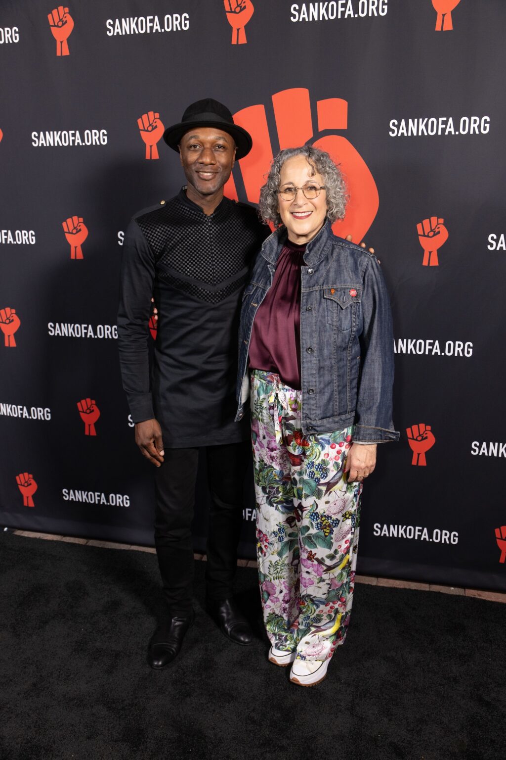 LOS ANGELES, CALIFORNIA - MARCH 1: Aloe Blacc and Gina Belafonte attend the inaugural Sankofa.org Social Justice Awards at Chaplin Studios on March 1, 2026 in Los Angeles, California. (Photo by Todd Westphal / Sankofa.org)