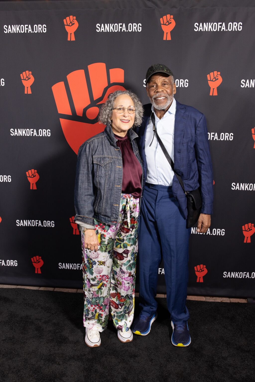 LOS ANGELES, CALIFORNIA - MARCH 1: Gina Belafonte and Danny Glover attend the inaugural Sankofa.org Social Justice Awards at Chaplin Studios on March 1, 2026 in Los Angeles, California. (Photo by Todd Westphal / Sankofa.org)