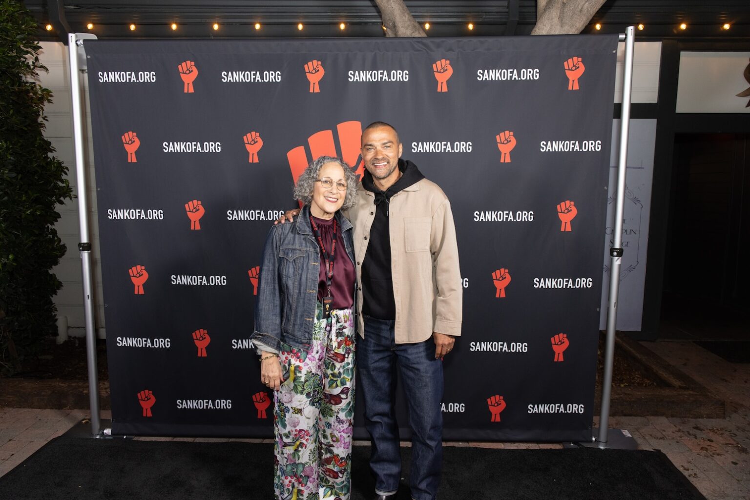 LOS ANGELES, CALIFORNIA - MARCH 1: Gina Belafonte and Jesse Williams pose at the inaugural Sankofa.org Social Justice Awards at Chaplin Studios on March 1, 2026 in Los Angeles, California. (Photo by Todd Westphal / Sankofa.org)