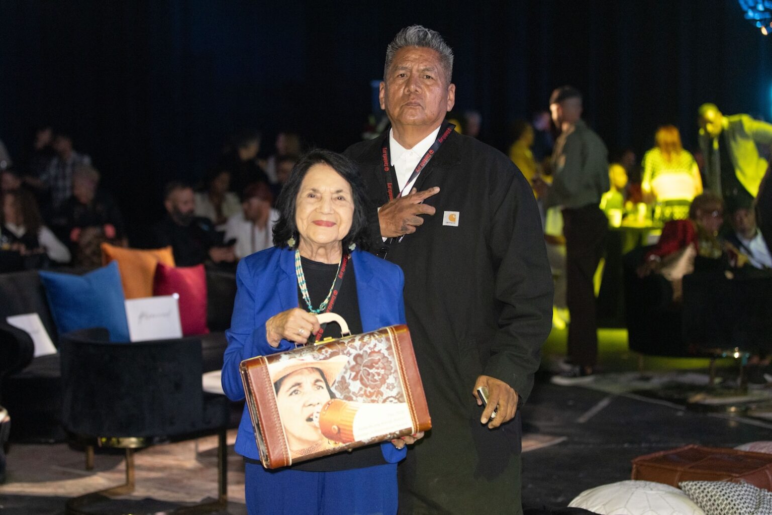 LOS ANGELES, CALIFORNIA - MARCH 1: Dolores Huerta poses with artist Douglas Miles, holding the lifetime achievement award created by Miles, during the inaugural Sankofa.org Social Justice Awards at Chaplin Studios on March 1, 2026 in Los Angeles, California. (Photo by Todd Westphal / Sankofa.org)